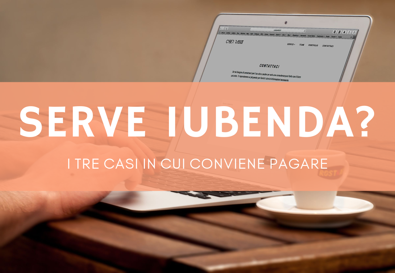 Mani su un portatile aperto sul sito di un'azienda, per capire se Iubenda serve
