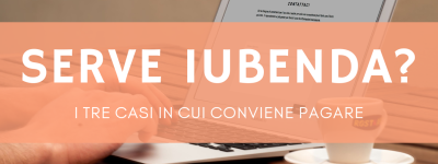 Mani su un portatile aperto sul sito di un'azienda, per capire se Iubenda serve